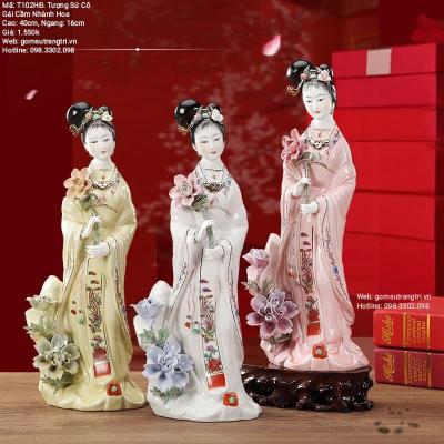 TƯỢNG SỨ CÔ GÁI CẦM NHÁNH HOA
